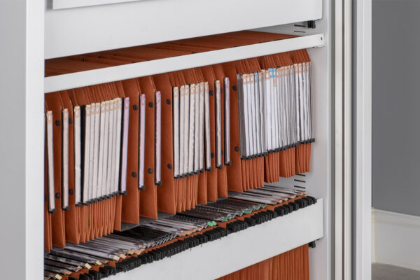 Lateral filing range for tambour storage