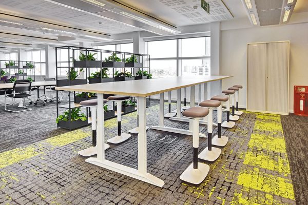 Height adjustable office table and stools