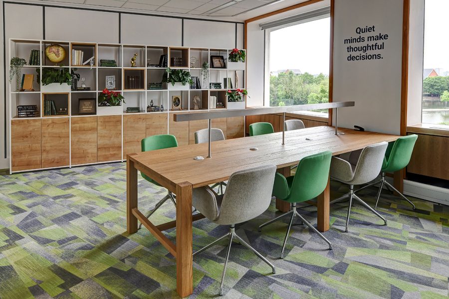 quiet working area with library table and office bookcase