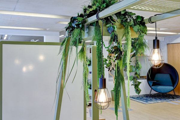 Larke office work table with preserved foliage