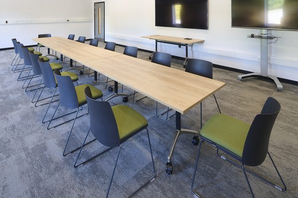 Meeting room flip top tables with stacking chairs