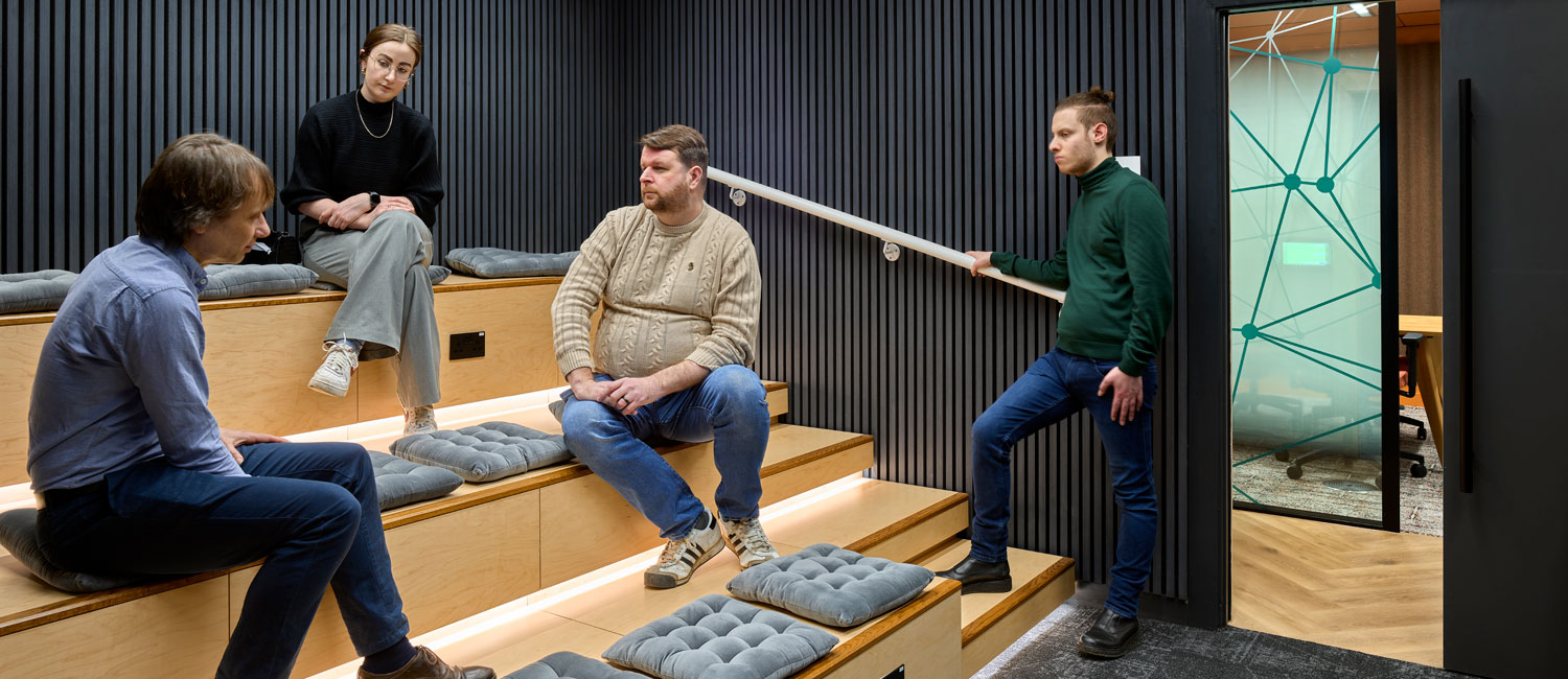 Staff using tiered seating to collaborate