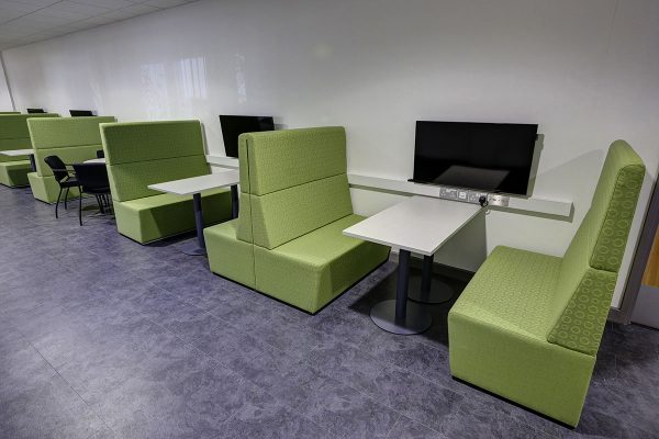 Fifteen Back-to-Back Banquette Sofas at Weston College