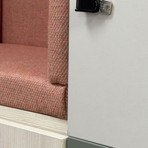 Match office storage wall with nook seating
